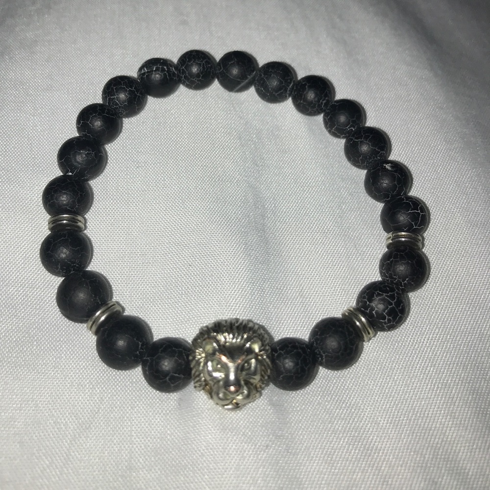 Silver save the lions bracelet